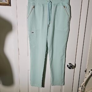 Cherokee Light Green Casual Pants. Elastic and Tie Waist. 5 Pockets. Size Large.